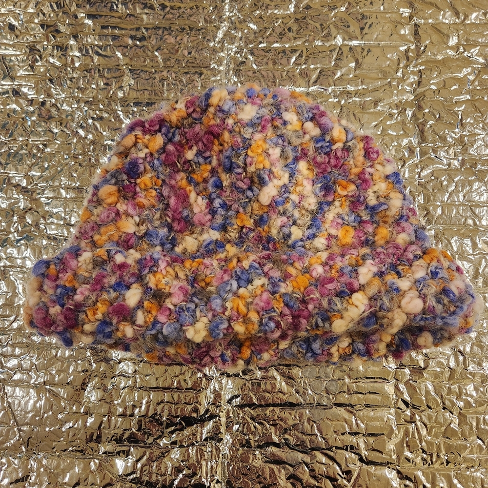 Very cute wool/alpaca hat made in Italy.  New with tags.